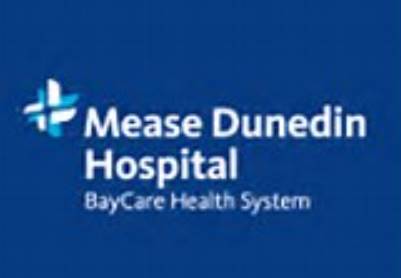 A blue and white logo for the mease dunedin hospital.